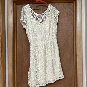 Ivory short lace dress lined.
